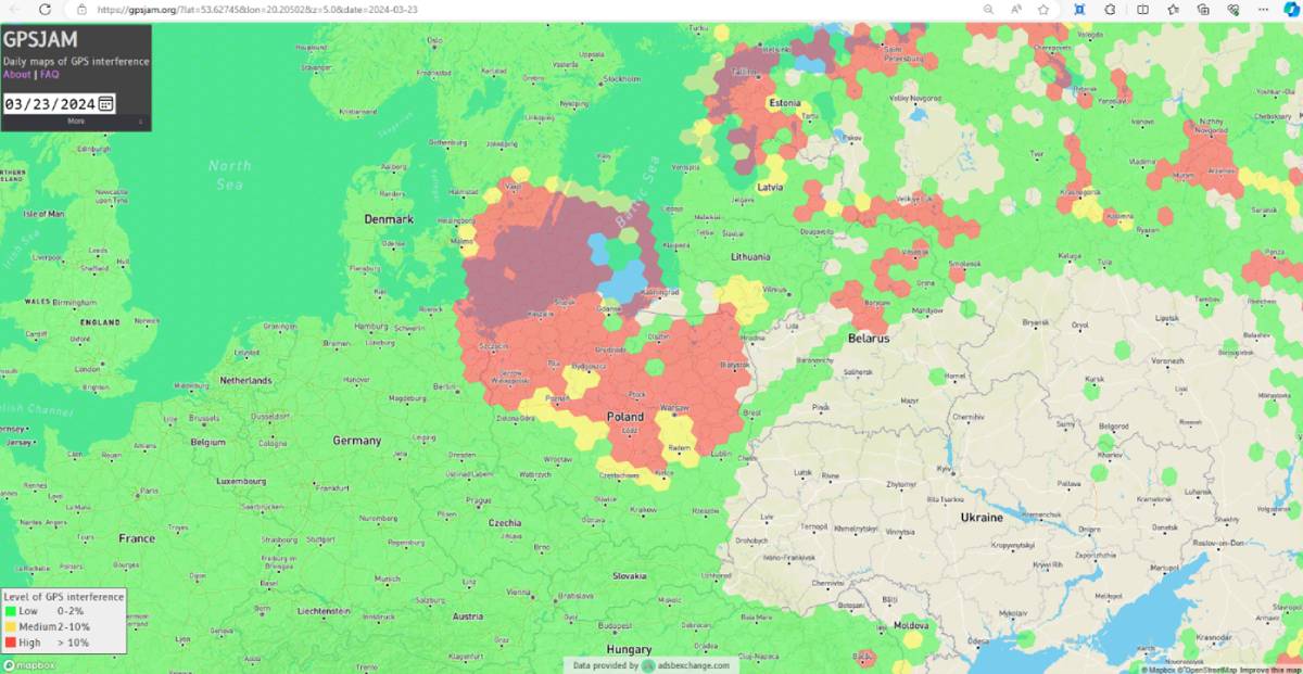 A map showing GPS interference levels across Europe, with high interference zones in red over Poland, Estonia, Latvia, and parts of Russia, and low interference zones in green.