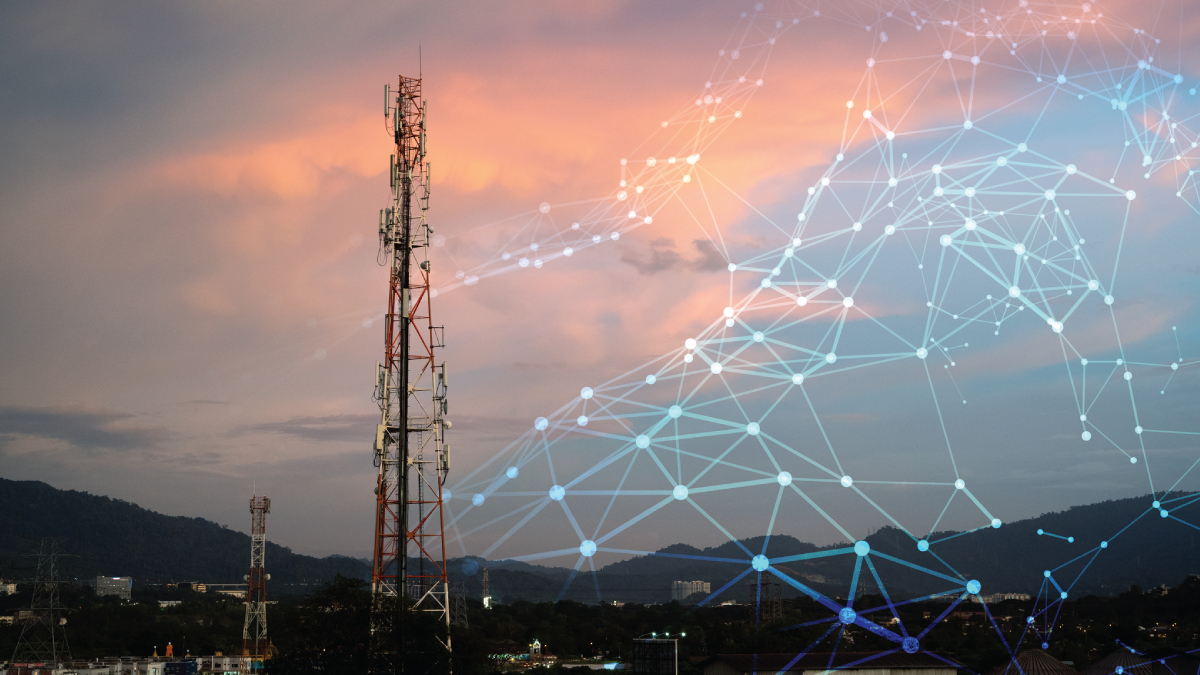Telecommunications towers at sunset over hills with an overlaid digital network of interconnected nodes and lines illustrating wireless connectivity.