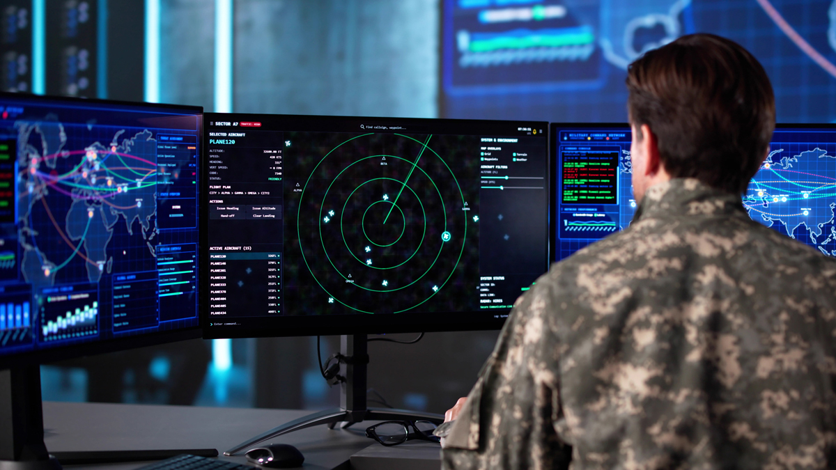 Military personnel in camouflage monitoring radar screens and global flight maps inside a high-tech command center.