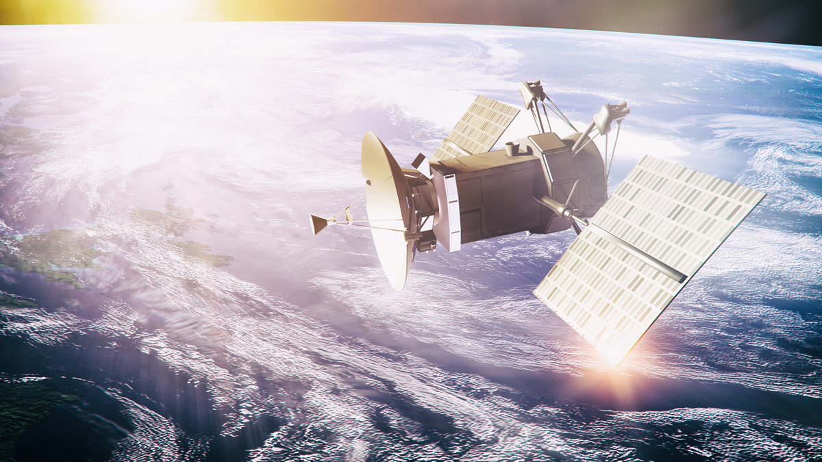 A communications satellite with solar panels and a dish antenna orbiting Earth in geostationary space.