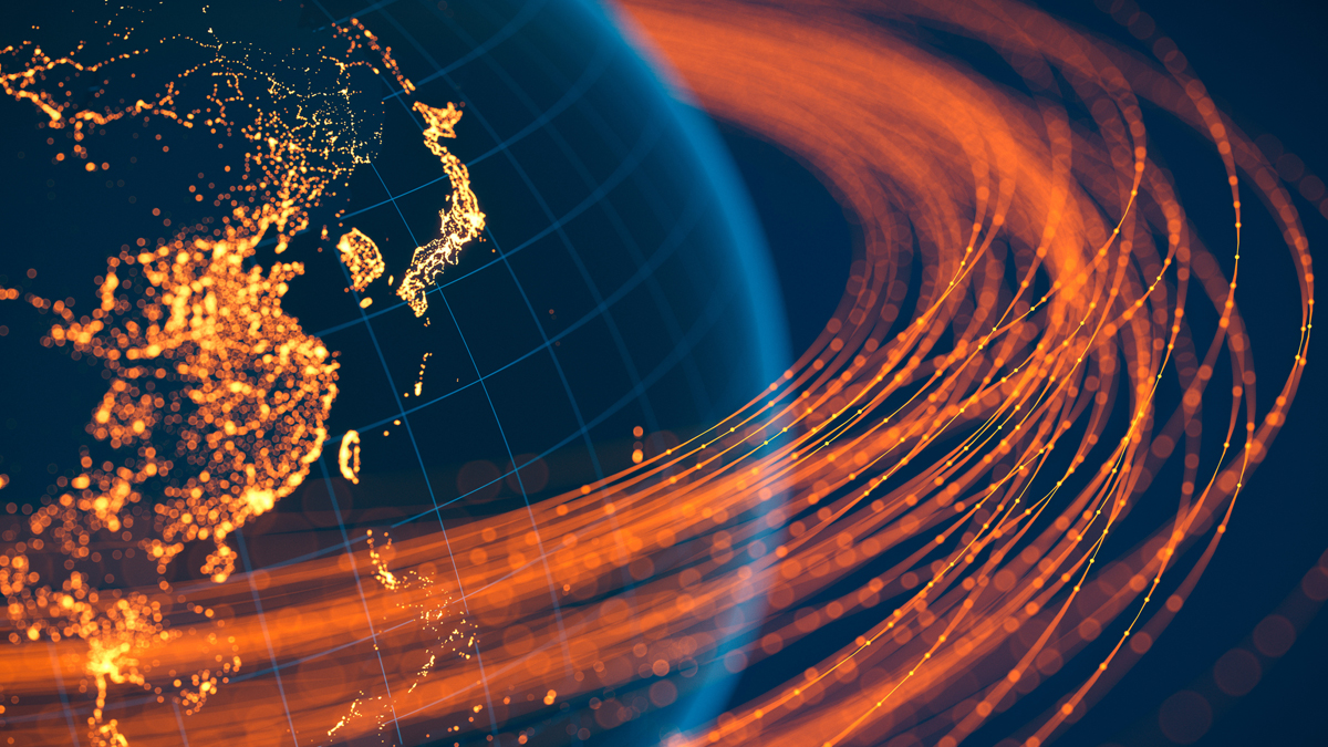 Digital globe showing glowing orange network connections across East Asia and the Pacific.