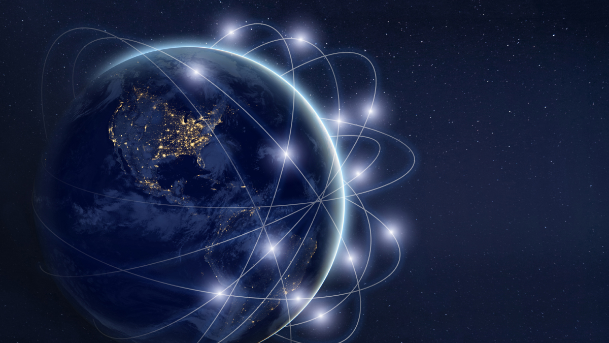 Digital rendering of Earth at night with glowing interconnected network lines representing global telecommunications.