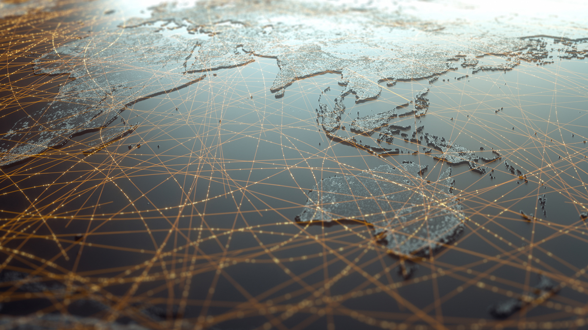 A digital, stylized world map centered on the Asia-Pacific region featuring interconnected, glowing golden lines that web across the oceans and continents to represent global networks and satellite connectivity.