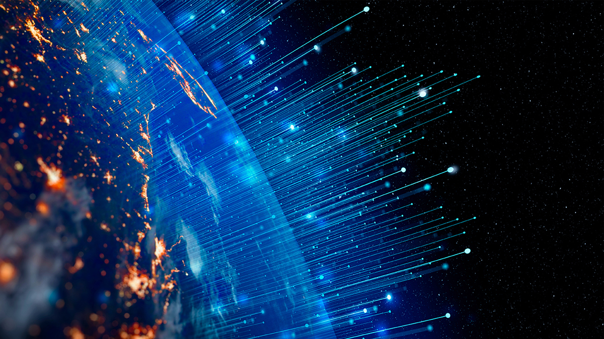 A stylized view of Earth from space with vibrant blue light trails and glowing data points emanating from the planet’s surface into orbit, symbolizing high-speed satellite connectivity and edge data processing.