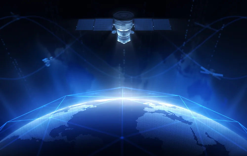 The image depicts a satellite in orbit above Earth, with a digital network grid and glowing lines surrounding the planet, symbolizing global communication or data transmission.